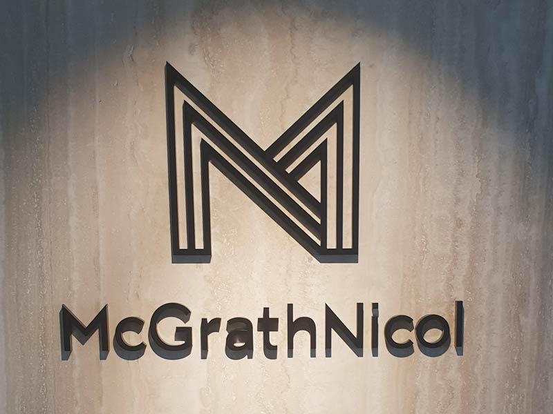 designer reception signage metal letters mcgrath nicol