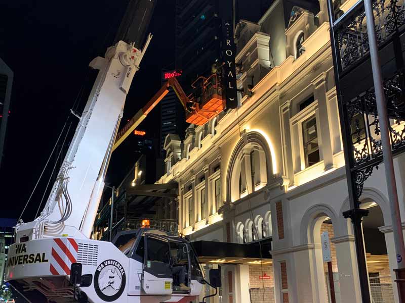 elevated work platform and crane installation of the royal hotel sign perth
